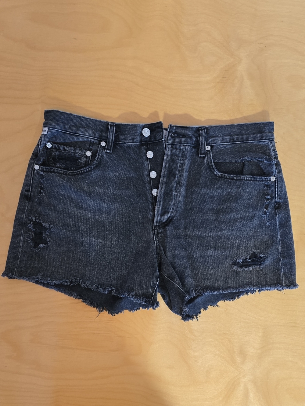 Citizens Of Humanity Washed Black Distressed Denim Cutoff Shorts